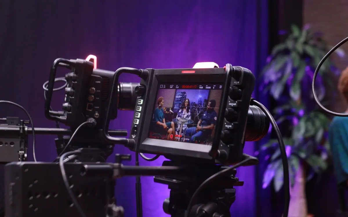 An interview set in silhouette