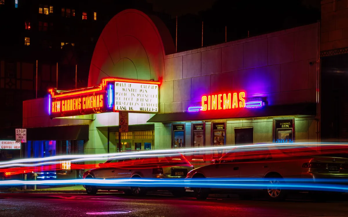 A cinema marquee at night